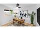 Office space with natural light, ceiling fan, and decor elements at 5505 Brentwood St, Arvada, CO 80002