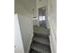Upstairs hallway with fresh paint and carpeting leading to bedrooms at 11113 E Alameda # 207, Aurora, CO 80012