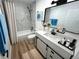 The bathroom is updated with a modern sink, hardware, and a shower with new tile at 11113 E Alameda # 207, Aurora, CO 80014