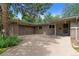 Close up of two car garage with wooden doors at 2717 S Langley Ct, Denver, CO 80210