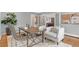 Elegant office space featuring hardwood floors, chairs, a desk, and neutral decor at 2717 S Langley Ct, Denver, CO 80210