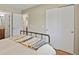 Bright bedroom with hardwood floors, closet, and full bathroom attached at 2557 S Dover St # 12, Lakewood, CO 80227