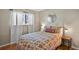 Inviting bedroom features hardwood floors, closet, and natural light at 2557 S Dover St # 12, Lakewood, CO 80227