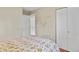 Comfortable bedroom boasts wood floors and closet space at 2557 S Dover St # 12, Lakewood, CO 80227