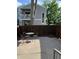 Cozy fenced patio area with outdoor furniture, perfect for relaxing or entertaining outdoors at 2557 S Dover St # 12, Lakewood, CO 80227