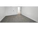 Bedroom has gray carpet, white walls, and doorway to another room at 11351 Quivas Way, Denver, CO 80234