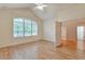 Spacious bedroom featuring wood-look flooring and a vaulted ceiling at 22834 E Davies Dr, Aurora, CO 80016