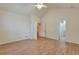 Spacious bedroom featuring wood-look flooring and a vaulted ceiling at 22834 E Davies Dr, Aurora, CO 80016