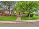 Charming stone-clad home with a well-manicured lawn and inviting walkway at 22834 E Davies Dr, Aurora, CO 80016