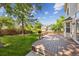 Enjoy outdoor living on the spacious deck overlooking the lush, green backyard at 9823 Salford Ln, Highlands Ranch, CO 80126