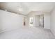 Large bedroom featuring vaulted ceilings, recessed lighting, a ceiling fan, and an attached bathroom at 9823 Salford Ln, Highlands Ranch, CO 80126