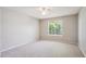 Bedroom with neutral carpet, ceiling fan, and natural light from the window at 9823 Salford Ln, Highlands Ranch, CO 80126