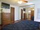 Spacious bedroom featuring wood floors, mirrored closet, and ceiling fan at 17671 E Brown Cir, Aurora, CO 80013