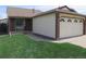 Charming single-story home featuring a well-manicured lawn and attached two car garage at 17671 E Brown Cir, Aurora, CO 80013