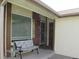 Cozy front porch with seating area and a welcoming entrance to the residence at 17671 E Brown Cir, Aurora, CO 80013