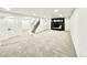Large finished basement with new carpet, a fireplace, and ample space for relaxation and entertainment at 8873 Princeton St, Westminster, CO 80031