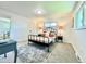 Charming bedroom with neutral colors, carpeted floors, and natural light from the window at 8873 Princeton St, Westminster, CO 80031