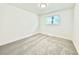 Bright bedroom with soft carpet and window that lets in natural light at 8873 Princeton St, Westminster, CO 80031