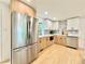 Bright kitchen with stainless steel appliances, granite countertops, and modern cabinets at 8873 Princeton St, Westminster, CO 80031
