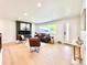 Spacious living room showcasing hardwood floors, and an open floor plan at 8873 Princeton St, Westminster, CO 80031