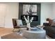 Cozy living room with modern decor featuring an electric fireplace and statement art at 8873 Princeton St, Westminster, CO 80031