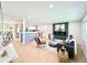 Open concept living room with hardwood floors and easy access to the kitchen at 8873 Princeton St, Westminster, CO 80031