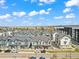 Wide aerial of new townhomes with a beautiful cityscape and community at 5148 Taft Ct, Wheat Ridge, CO 80033