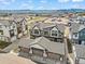 Aerial view of new townhomes surrounded by scenic mountain views and a vibrant community at 5148 Taft Ct, Wheat Ridge, CO 80033