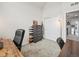 Spacious office featuring desks, chairs, vaulted ceilings, and closet at 5148 Taft Ct, Wheat Ridge, CO 80033