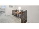 Cozy upstairs landing area with a wooden console table and decorative elements at 5148 Taft Ct, Wheat Ridge, CO 80033