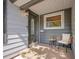 Cozy front porch featuring stylish seating and modern design elements at 5152 Bryant St, Denver, CO 80221