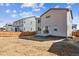 A spacious backyard with dirt ready for landscaping or a new lawn at 1397 Brookfield Pl, Erie, CO 80026