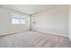 Spacious bedroom with two large windows and neutral carpeting at 1397 Brookfield Pl, Erie, CO 80026