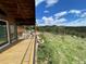 Expansive deck with sweeping mountain views, ideal for outdoor entertaining and relaxation at 393 Dixon Rd, Boulder, CO 80302