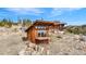 Modern home with expansive views, a wood exterior, and a private balcony at 393 Dixon Rd, Boulder, CO 80302