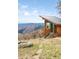 Charming exterior view of a cabin with mountain views and lush surroundings at 393 Dixon Rd, Boulder, CO 80302