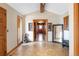 Open foyer showcasing tile flooring, warm lighting, and decorative accents at 393 Dixon Rd, Boulder, CO 80302