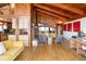 Spacious living room with hardwood floors, vaulted ceilings, and a unique rustic design at 393 Dixon Rd, Boulder, CO 80302
