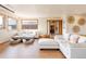 Bright and spacious living room with modern white sofas and stylish decor at 393 Dixon Rd, Boulder, CO 80302