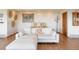 Comfortable living room featuring a white sectional sofa, stylish decor, and natural light at 393 Dixon Rd, Boulder, CO 80302