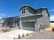 Well-maintained two-story home with a two-car garage and low maintenance landscaping at 10984 Snowdon St, Parker, CO 80134