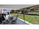 Comfortable covered patio with outdoor seating, great for relaxation at 13472 W Dakota Ave, Lakewood, CO 80228