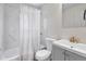 Stylish bathroom featuring a tub-shower combo, modern vanity, and contemporary fixtures at 9320 Fir Dr, Thornton, CO 80229