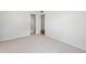 Clean bedroom featuring carpet, neutral walls, and closet for seamless organization at 9320 Fir Dr, Thornton, CO 80229