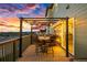 Back deck with outdoor lighting, seating and great views for entertaining at 12705 Buffington Trl, Parker, CO 80134