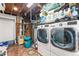 This laundry room is equipped with a washer, dryer and other appliances at 2210 Miller St, Lakewood, CO 80215