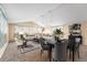 Spacious living and dining area with neutral tones and modern furnishings at 2210 Miller St, Lakewood, CO 80215