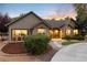 Charming single-story home featuring professional landscaping, decorative rock and inviting curb appeal at 1392 W Caley Ave, Littleton, CO 80120