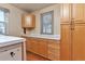 Additional kitchen view with wood cabinets and countertop at 13581 Sable Blvd, Brighton, CO 80601