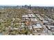 Wide angle aerial neighborhood view with downtown skyline and surrounding residential homes at 34 W Maple Ave, Denver, CO 80223